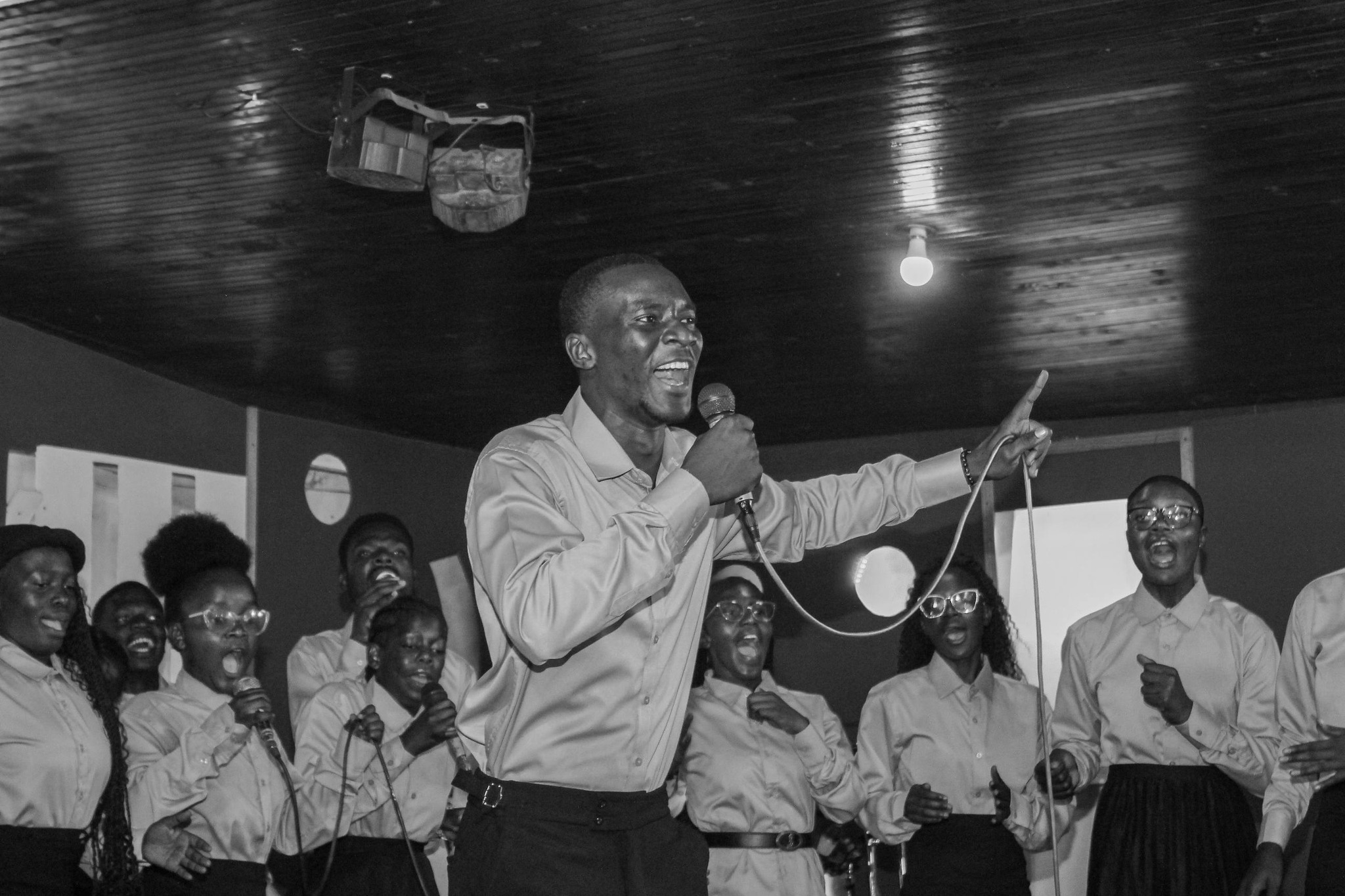 A speaker addressing delegates at the podium