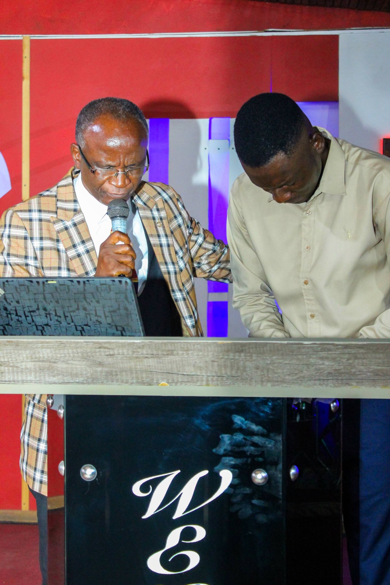 Speaker addressing delegates at the Kopala Men's Conference seminar